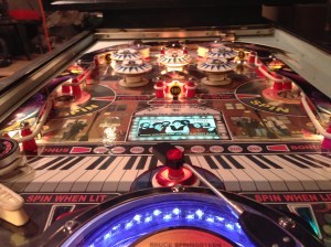 Looking up field at all the pretty lights and artwork inspired by "The Boss" in his early years.